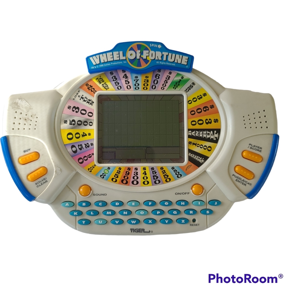 Wheel of Fortune by tiger Handheld Video Game Tiger Electronics 1999 + 2 games